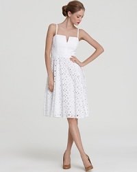 Fashioned in delicate eyelet, this gorgeously tailored Milly dress exudes ladylike charm. Fashioned in delicate eyelet, this gorgeously tailored Milly dress exudes ladylike charm.