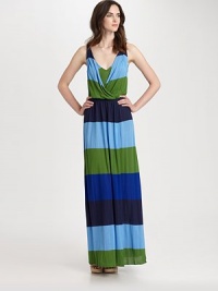 Bold, colorful stripes band this easy-to-wear floor-length silhouette.V necklineDraped surplice overlayGathered skirtFront slitAbout 42 from natural waistRayonDry cleanImportedModel shown is 5'10 (177cm) wearing US size Small. Bold, colorful stripes band this easy-to-wear floor-length silhouette.V necklineDraped surplice overlayGathered skirtFront slitAbout 42 from natural waistRayonDry cleanImportedModel shown is 5'10 (177cm) wearing US size Small.