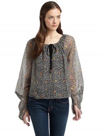 THE LOOKFloral and leaf printSemi-sheer designMetallic accentsDrawstring neckline with contrast tieContrasting keyhole detailLong sleeves with modified gathered effectTHE FITAbout 21 from shoulder to hemTHE MATERIALNylon/polyesterCARE & ORIGINHand washMade in USAModel shown is 5'9 (175cm) wearing US size Small. THE LOOKFloral and leaf printSemi-sheer designMetallic accentsDrawstring neckline with contrast tieContrasting keyhole detailLong sleeves with modified gathered effectTHE FITAbout 21 from shoulder to hemTHE MATERIALNylon/polyesterCARE & ORIGINHand washMade in USAModel shown is 5'9 (175cm) wearing US size Small.