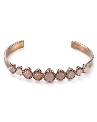 Equal parts pretty and punk. House of Harlow's plated cuff lends a killer dose of cool, cast in rose gold and accented by Gothic skull-shaped stations. Equal parts pretty and punk. House of Harlow's plated cuff lends a killer dose of cool, cast in rose gold and accented by Gothic skull-shaped stations.