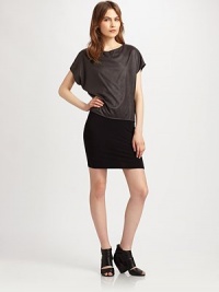 With the look of suede and a velvety texture, this understated dolman top pairs effortlessly with skirts, pants and jeans. BoatneckShort dolman sleevesTubular piping at hemPolyesterDry cleanMade in USA of imported fabricModel shown is 5'10 (177cm) wearing US size Small. With the look of suede and a velvety texture, this understated dolman top pairs effortlessly with skirts, pants and jeans. BoatneckShort dolman sleevesTubular piping at hemPolyesterDry cleanMade in USA of imported fabricModel shown is 5'10 (177cm) wearing US size Small.