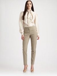 Nothing interrupts the clean, smooth lines of this sleek ankle-grazing style in a light wool blend.Narrow waistband with single button closeHidden zip flyFront and back dartsSlim fit from hips to hemFully linedRise, about 9½Inseam, about 2855% polyester/45% woolDry cleanImported Model shown is 5'10 (177cm) wearing US size 4. Nothing interrupts the clean, smooth lines of this sleek ankle-grazing style in a light wool blend.Narrow waistband with single button closeHidden zip flyFront and back dartsSlim fit from hips to hemFully linedRise, about 9½Inseam, about 2855% polyester/45% woolDry cleanImported Model shown is 5'10 (177cm) wearing US size 4.