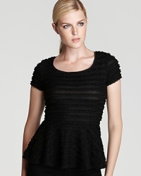 An allover ruffle texture take this flirty peplum top from Aqua to the next level. Pair it with a pencil skirt for instant hourglass allure. An allover ruffle texture take this flirty peplum top from Aqua to the next level. Pair it with a pencil skirt for instant hourglass allure.