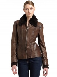 THE LOOKSheep fur pointed collarZip closureLong sleeves with ribbed knit and zip cuffsLace-up details along sidesDual besom pocketsTHE FITAbout 24 from shoulder to hemTHE MATERIALLeatherFur: natural sheepCARE & ORIGINDry clean by fur specialistImportedFur origin: ItalyModel shown is 5'10 (177cm) wearing US size 4. THE LOOKSheep fur pointed collarZip closureLong sleeves with ribbed knit and zip cuffsLace-up details along sidesDual besom pocketsTHE FITAbout 24 from shoulder to hemTHE MATERIALLeatherFur: natural sheepCARE & ORIGINDry clean by fur specialistImportedFur origin: ItalyModel shown is 5'10 (177cm) wearing US size 4.