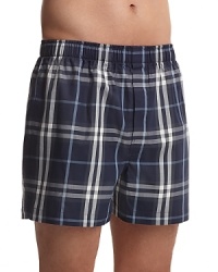 Hidden elastic waist band boxers with all over check pattern. One button fly. Hidden elastic waist band boxers with all over check pattern. One button fly.