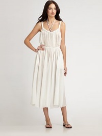 The gorgeous result of the union between braided details and glam gathered cotton. Jewel neckElastic waistCottonDry cleanImported The gorgeous result of the union between braided details and glam gathered cotton. Jewel neckElastic waistCottonDry cleanImported
