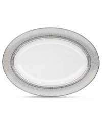 Lavishly detailed with shimmering platinum scrolls and scalloping, the Odessa Platinum bone china oval serving platter is a grand example of formal serveware. Coordinates with a full range of accessories and formal place settings. By Noritake. Lavishly detailed with shimmering platinum scrolls and scalloping, the Odessa Platinum bone china oval serving platter is a grand example of formal serveware. Coordinates with a full range of accessories and formal place settings. By Noritake.