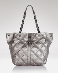 Quilted leather is a hallmark of ladylike style. Milly's tote gets it day-right with a spacious, shoulder right shape and polished trims. Quilted leather is a hallmark of ladylike style. Milly's tote gets it day-right with a spacious, shoulder right shape and polished trims.