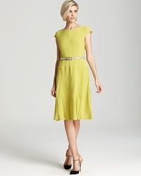 A swing skirt lends a ladylike look to this belted, figure-flattering Anne Klein dress. A swing skirt lends a ladylike look to this belted, figure-flattering Anne Klein dress.