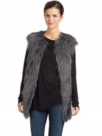 THE LOOKVariegated faux fur design Round necklineFront fur hook closuresSleevelessSeam pocketsTHE FITAbout 29 from shoulder to hemTHE MATERIALPolyester/acrylicCARE & ORIGINDry cleanImportedModel shown is 5'10 (177cm) wearing US size Small. 