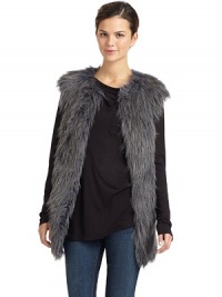 THE LOOKVariegated faux fur design Round necklineFront fur hook closuresSleevelessSeam pocketsTHE FITAbout 29 from shoulder to hemTHE MATERIALPolyester/acrylicCARE & ORIGINDry cleanImportedModel shown is 5'10 (177cm) wearing US size Small. THE LOOKVariegated faux fur design Round necklineFront fur hook closuresSleevelessSeam pocketsTHE FITAbout 29 from shoulder to hemTHE MATERIALPolyester/acrylicCARE & ORIGINDry cleanImportedModel shown is 5'10 (177cm) wearing US size Small.