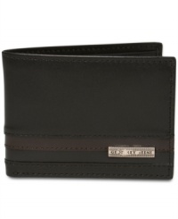 A leather bifold wallet from Geoffrey Beene that's slim enough to stow in any pocket, but big enough to hold every card and ID you might need, featuring a flip-up ID case and a total of ten credit card slots. A leather bifold wallet from Geoffrey Beene that's slim enough to stow in any pocket, but big enough to hold every card and ID you might need, featuring a flip-up ID case and a total of ten credit card slots.