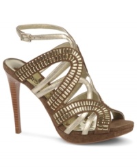 Metallic overload! Carlos by Carlos Santana's Tzarina platform dress sandals feature shiny crisscrossing arcs that add shimmer and decorated detail to your dressiest looks. Metallic overload! Carlos by Carlos Santana's Tzarina platform dress sandals feature shiny crisscrossing arcs that add shimmer and decorated detail to your dressiest looks.
