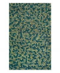 Indulge in a scenic stroll along the ocean's edge ... in your home. The Gallia Pom Pom Ocean rug provides the ultimate sensory experience. Hand hooking and hand tufting techniques create a striking, multidimensional piece with a uniquely textured feel. Mosaic-like blending of aquatic blue and green shades produces a deep, rich result. A truly Neptunian pleasure! Indulge in a scenic stroll along the ocean's edge ... in your home. The Gallia Pom Pom Ocean rug provides the ultimate sensory experience. Hand hooking and hand tufting techniques create a striking, multidimensional piece with a uniquely textured feel. Mosaic-like blending of aquatic blue and green shades produces a deep, rich result. A truly Neptunian pleasure!
