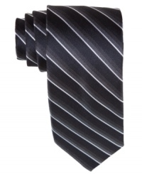 Stripes and a skinny style on this Bar III tie provide the perfect complement to any sleek day-to-night look. Stripes and a skinny style on this Bar III tie provide the perfect complement to any sleek day-to-night look.