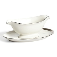 This gravy boat glows with a hand-painted bright platinum design to create a contemporary classic on your table that will complement your dining experience throughout a lifetime of shifting trends and evolving fashions. This gravy boat glows with a hand-painted bright platinum design to create a contemporary classic on your table that will complement your dining experience throughout a lifetime of shifting trends and evolving fashions.