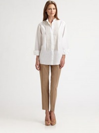 Chic grosgrain trim decorates the bib of this crisply tailored cotton design.Band collarConcealed button frontGrosgrain trimLong sleeves with button cuffsAbout 26 from shoulder to hemCottonDry cleanImported of Swiss fabricModel shown is 5'10 (177cm) wearing US size 4. 