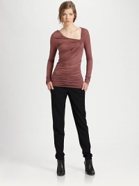 Flatter your figure with allover ruching and an asymmetrically twisted neckline. Asymmetrically twisted necklineLong sleevesAllover ruchingLonger length hits below the hipsMicro modalDry cleanImported of Italian fabricModel shown is 5'10 (177cm) wearing US size Small. Flatter your figure with allover ruching and an asymmetrically twisted neckline. Asymmetrically twisted necklineLong sleevesAllover ruchingLonger length hits below the hipsMicro modalDry cleanImported of Italian fabricModel shown is 5'10 (177cm) wearing US size Small.