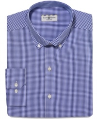 Roll up your sleeves. With a contrasting pattern in the inner cuffs, this shirt from Calvin Klein gets down to business.