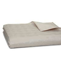 The neat box stitch adorning this luminous satin Hudson Park king coverlet in a soothing, versatile taupe evokes modern simplicity and sophistication. The neat box stitch adorning this luminous satin Hudson Park king coverlet in a soothing, versatile taupe evokes modern simplicity and sophistication.