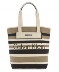 Wear with that breezy dress for rooftop cocktails or shorts and sandals by the beach, this every-occasion tote from Calvin Klein is the perfect companion. Dressed up in subtle stripes and discrete logo lettering for a look that's undecidedly delightful. Wear with that breezy dress for rooftop cocktails or shorts and sandals by the beach, this every-occasion tote from Calvin Klein is the perfect companion. Dressed up in subtle stripes and discrete logo lettering for a look that's undecidedly delightful.