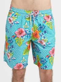 Aqua print swim trunk with drawstring and full elastic waist and rear eyelets to avoid a ballooning effect, crafted in quick-drying nylon.Elastic drawstring waistSide slash, back flap pocketsInseam, about 9PolyamideMachine washImported Aqua print swim trunk with drawstring and full elastic waist and rear eyelets to avoid a ballooning effect, crafted in quick-drying nylon.Elastic drawstring waistSide slash, back flap pocketsInseam, about 9PolyamideMachine washImported