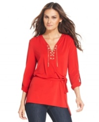 MICHAEL Michael Kors puts a twist on the traditional lace-up tunic, outfitting this placket with a stunning gold chain instead. MICHAEL Michael Kors puts a twist on the traditional lace-up tunic, outfitting this placket with a stunning gold chain instead.