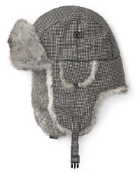 A distinguished tweed hat in a classic aviator shape gets a boost of luxury from the rabbit fur trim, a decadent touch with timeless masculine appeal. A distinguished tweed hat in a classic aviator shape gets a boost of luxury from the rabbit fur trim, a decadent touch with timeless masculine appeal.