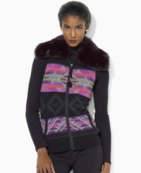 Rendered in a vibrant Fair Isle pattern, Lauren Ralph Lauren's cozy petite sweater vest is finished with luxe faux fur at the collar. Rendered in a vibrant Fair Isle pattern, Lauren Ralph Lauren's cozy petite sweater vest is finished with luxe faux fur at the collar.
