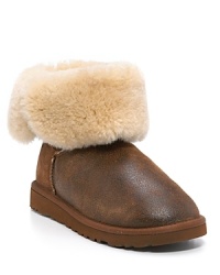 UGG® Australia distressed leather ankle boots with genuine shearling lining will keep your feet in ultimate comfort. Shearling cuff can be worn up or down for a more versatile look. Functional elastic loop and button at side and rubber wafer sole. UGG® Australia distressed leather ankle boots with genuine shearling lining will keep your feet in ultimate comfort. Shearling cuff can be worn up or down for a more versatile look. Functional elastic loop and button at side and rubber wafer sole.