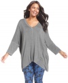 Score a comfy casual look with Cha Cha Vente's three-quarter-sleeve plus size top, punctuated by a handkerchief hem.