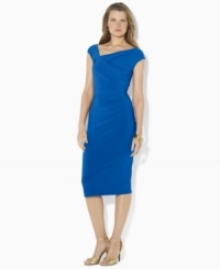 A timeless sheath dress in figure-flattering matte jersey is modernized in a cap-sleeved silhouette with elegant draping at the hip, from Lauren by Ralph Lauren.