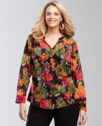 A bold floral print pops against a backdrop of black mesh fabric on INC's plus size shirt. Rhinestone buttons provide a touch of extra sparkle. A bold floral print pops against a backdrop of black mesh fabric on INC's plus size shirt. Rhinestone buttons provide a touch of extra sparkle.