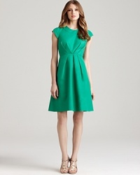 Catering to this season's ladylike trend, this kate spade new york dress emboldens your everyday style with a vibrant, retro silhouette. Add a dash of pearls and a pair of heels for full-on feminine glamour. Catering to this season's ladylike trend, this kate spade new york dress emboldens your everyday style with a vibrant, retro silhouette. Add a dash of pearls and a pair of heels for full-on feminine glamour.