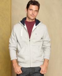 Check under the hood. This hoodie from Tommy Hilfiger is ready for your casual collection. Check under the hood. This hoodie from Tommy Hilfiger is ready for your casual collection.