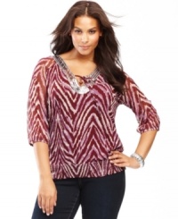 Get glowing with INC's plus size peasant top. Shimmering sequins at the neckline offset a bold print! Get glowing with INC's plus size peasant top. Shimmering sequins at the neckline offset a bold print!