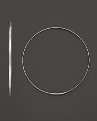 A graceful hoop in white gold with invisible closure to create a perfectly elegant orb to complement your most refined ensembles. Designed by Lana. A graceful hoop in white gold with invisible closure to create a perfectly elegant orb to complement your most refined ensembles. Designed by Lana.