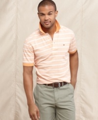 Dressed up or town, this polo shirt from Tommy Hilfiger is and indispensable part of your summer style. Dressed up or town, this polo shirt from Tommy Hilfiger is and indispensable part of your summer style.