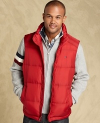 Keep it fresh with this preppy faux-down filled puffer vest from Tommy Hilfiger. Keep it fresh with this preppy faux-down filled puffer vest from Tommy Hilfiger.