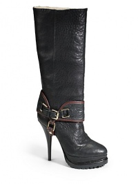 THE LOOKOval toeEquestrian-inspired wrap-around buckle detailPull-on styleShearling-lined shaftLug soleStacked heel 5 (125mm)Self-covered and lug sole platform, 1¼ (30mm)Compares to a 3¾ heel (95mm)Shaft 13Circumference 15THE MATERIALLeather upperLeather and shearling lining Leather and lug sole ORIGINImportedFur origin: Brazil THE LOOKOval toeEquestrian-inspired wrap-around buckle detailPull-on styleShearling-lined shaftLug soleStacked heel 5 (125mm)Self-covered and lug sole platform, 1¼ (30mm)Compares to a 3¾ heel (95mm)Shaft 13Circumference 15THE MATERIALLeather upperLeather and shearling lining Leather and lug sole ORIGINImportedFur origin: Brazil