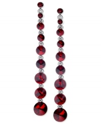 Look radiant in red with this pair of linear earrings from GUESS. Crafted from hematite-tone mixed metal, the earrings dazzle with glass crystal stones. Item comes packaged in a signature GUESS Gift Box. Approximate drop: 4 inches. Look radiant in red with this pair of linear earrings from GUESS. Crafted from hematite-tone mixed metal, the earrings dazzle with glass crystal stones. Item comes packaged in a signature GUESS Gift Box. Approximate drop: 4 inches.