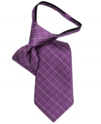 Etched in silk. This grid tie from Calvin Klein will give his buttoned-up look a classic finish with a simple zip closure. Etched in silk. This grid tie from Calvin Klein will give his buttoned-up look a classic finish with a simple zip closure.