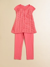 Sweet eyelets adorn a plush cotton tunic with matching leggings for a vibrant, classic ensemble.V-neckShort cap sleevesButton frontFront yokeFlared shapeElastic waistbandCottonMachine washImported Sweet eyelets adorn a plush cotton tunic with matching leggings for a vibrant, classic ensemble.V-neckShort cap sleevesButton frontFront yokeFlared shapeElastic waistbandCottonMachine washImported