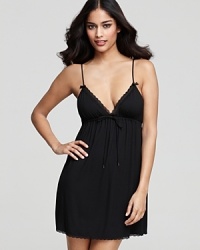 A stylish, flowy nightie with a lace trimmed V-neckline and bow embellished straps. A stylish, flowy nightie with a lace trimmed V-neckline and bow embellished straps.
