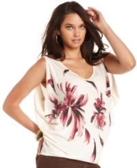 Rhinestones add sparkle to this GUESS floral-print top for a casual look that shines! Rhinestones add sparkle to this GUESS floral-print top for a casual look that shines!