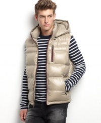 Shine on. Bright colors make this puffer vest from Guess Jeans a seasonal standout. Shine on. Bright colors make this puffer vest from Guess Jeans a seasonal standout.