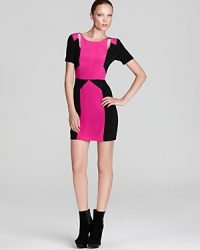 Vibrant colorblocking and cheeky cutouts make this hot-pink dress a hot choice when you go out this season. Vibrant colorblocking and cheeky cutouts make this hot-pink dress a hot choice when you go out this season.