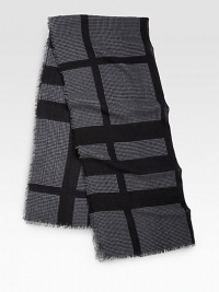 A warm wool style in a iconic check pattern accented in classic houndstooth. WoolAbout 27½ X 59Dry cleanMade in Italy A warm wool style in a iconic check pattern accented in classic houndstooth. WoolAbout 27½ X 59Dry cleanMade in Italy
