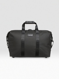 A classic soft satchel design in a smaller size, ideal for overnight or more relaxed travel with a roomy main compartment and sturdy ballistic nylon construction. Zip closure Removable, adjustable shoulder strap Carry handles with leather wrap Interior zip pocket and key hook 20W X 14H X 9D Imported A classic soft satchel design in a smaller size, ideal for overnight or more relaxed travel with a roomy main compartment and sturdy ballistic nylon construction. Zip closure Removable, adjustable shoulder strap Carry handles with leather wrap Interior zip pocket and key hook 20W X 14H X 9D Imported
