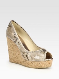 Stylish yet practical, this snake-print leather design is elevated by a cork wedge and finished with a classic peep toe. Cork wedge, 4½ (115mm)Cork platform, 1¼ (30mm)Compares to a 3¼ heel (80mm)Snake-print leather upperPeep toeLeather liningRubber solePadded insoleMade in Italy Stylish yet practical, this snake-print leather design is elevated by a cork wedge and finished with a classic peep toe. Cork wedge, 4½ (115mm)Cork platform, 1¼ (30mm)Compares to a 3¼ heel (80mm)Snake-print leather upperPeep toeLeather liningRubber solePadded insoleMade in Italy